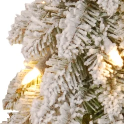 4 ft. Pre-Lit Snowy Downswept Forest Tree with Clear Lights