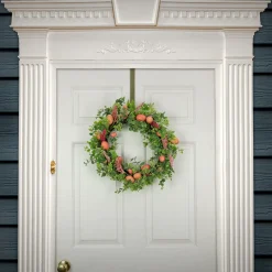 22 in. Easter Wreath Decorated with Pink Pastel Eggs, Pink Flowers, Leafy Greens