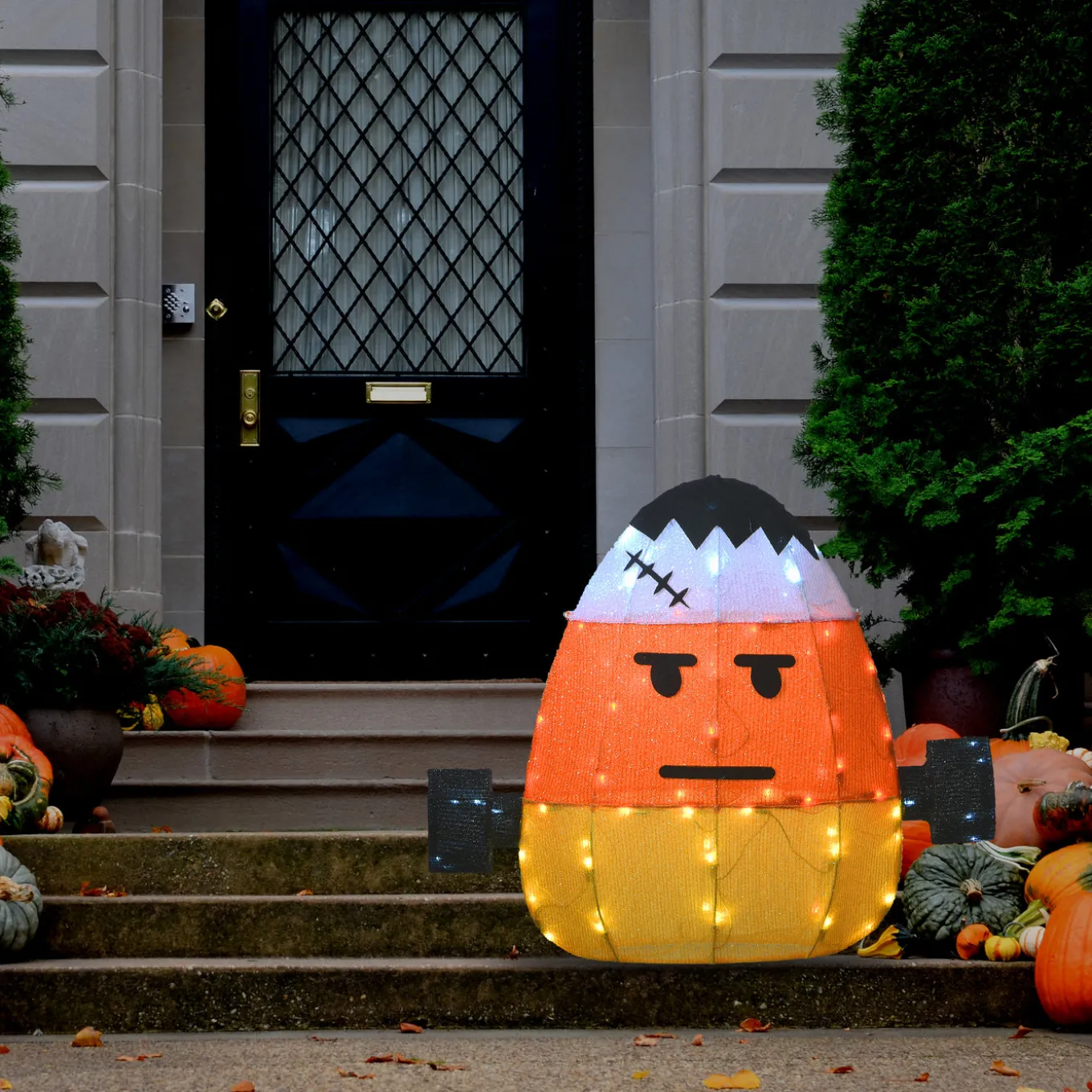 24 in. Halloween Pre-Lit Candy Corn Frankenstein Outdoor Decoration with LED Lights